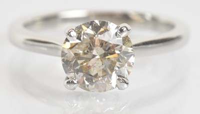 Lot 32 - An 18ct white gold diamond solitaire ring, the...