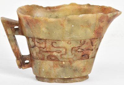 Lot 626 - A Chinese carved hardstone libation cup, with...