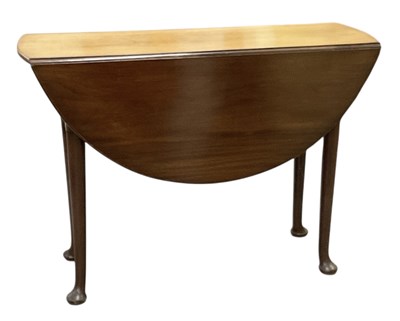 Lot 76 - A late 19th century mahogany drop-leaf table,...