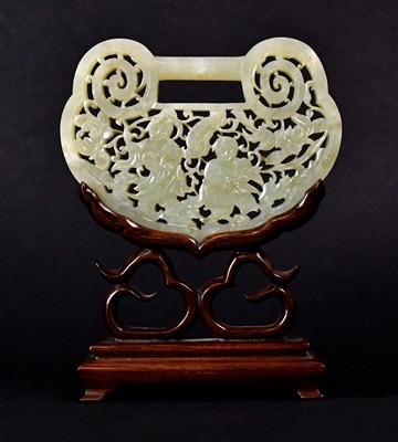 Lot 221 - A 19th century Qing dynasty celadon jade lock,...