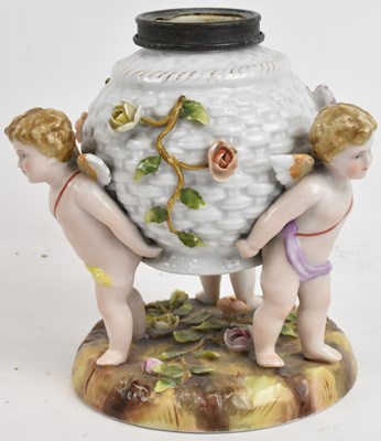 Lot 590 - A Continental floral encrusted porcelain oil...