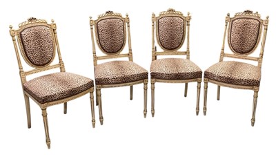 Lot 57 - A set of four French reproduction white...