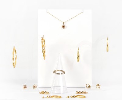 Lot 856 - A group of 9ct yellow gold earrings, to...