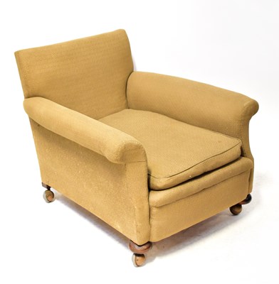 Lot 49 - A late 19th century deep low armchair in the...