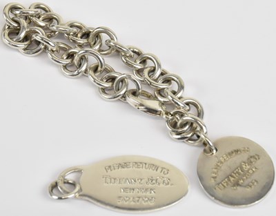 Lot 1318 - TIFFANY & CO; a 925 hallmarked silver charm...