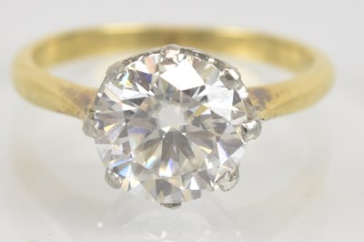 Lot 1231 - An 18ct yellow gold and platinum diamond...