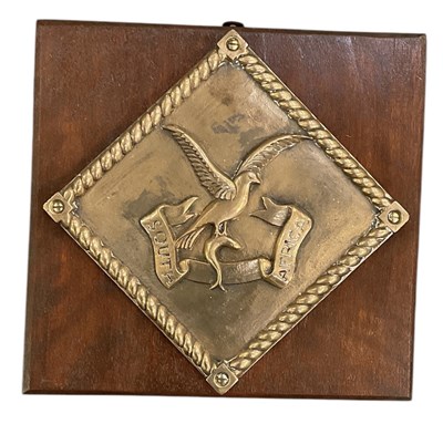 Lot 393 - An early 20th century oak mounted brass boat...