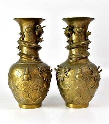Lot 211 - A pair of early 20th century Chinese brass...