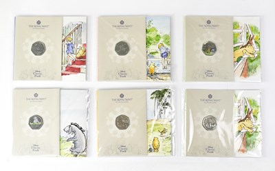 Lot 696 - WINNIE THE POOH; six Brilliant Uncirculated...