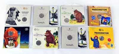 Lot 643 - Eight Brilliant Uncirculated commemorative 50p...