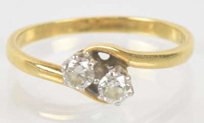 Lot 1257 - An 18ct yellow gold diamond set two stone...