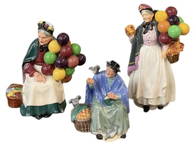 Lot 600 - ROYAL DOULTON; three porcelain figures...