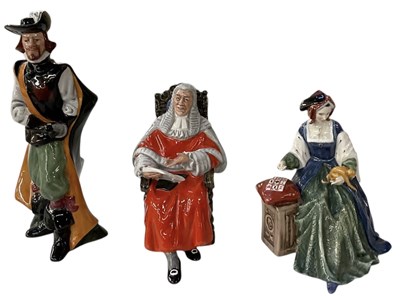 Lot 594 - ROYAL DOULTON; three porcelain figures...