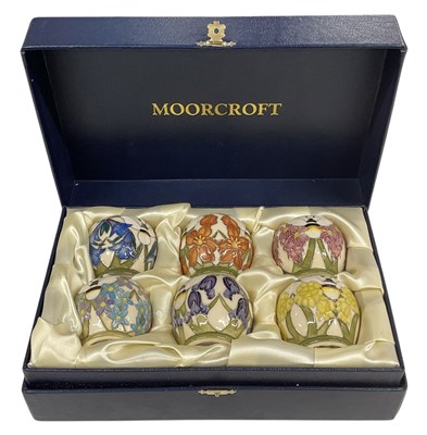 Lot 592 - MOORCROFT; a modern set of six tube lined...