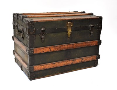 Lot 112 - An early 20th century leather and wood bound...
