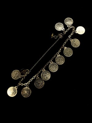Lot 1177 - A yellow metal chain stamped 14k and with...