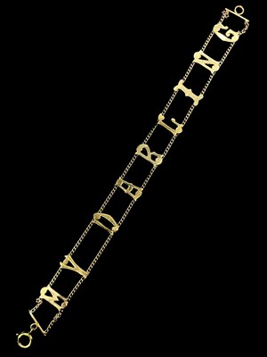 Lot 1178 - A 9ct yellow gold bracelet set with the...