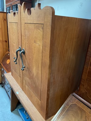 Lot 27 - An oak cupboard on stand, the top with pair of...