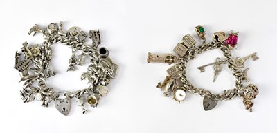 Lot 836 - Two hallmarked silver charm bracelets set with...