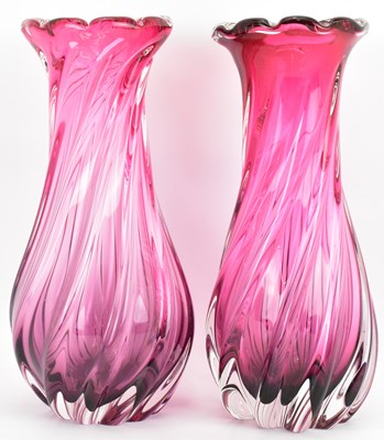 Lot 466 - A pair of tall cranberry and clear art glass...