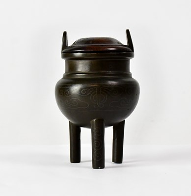Lot 222 - An 18th century Chinese silver inlaid bronze...