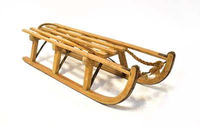 Lot 388 - DAVOS; a vintage wooden sled, with slatted...