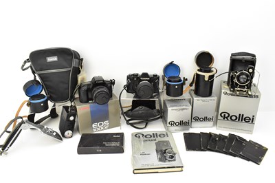 Lot 411 - A quantity of vintage cameras and accessories,...