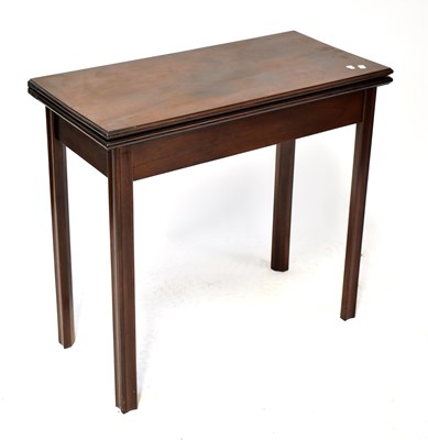 Lot 74 - A 19th century mahogany fold-over tea table on...