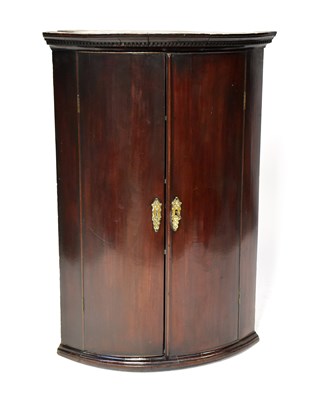 Lot 87 - A George III mahogany bow-fronted,...