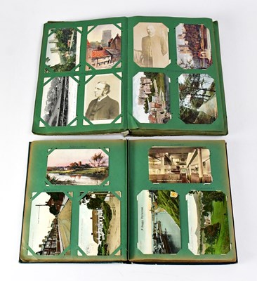 Lot 569 - Three postcard albums containing Edwardian and...