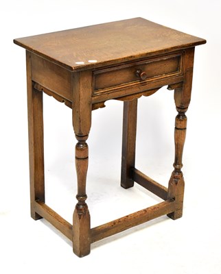 Lot 99 - A reproduction oak joint occasional table with...