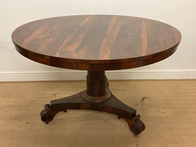 Lot 590 - An early Victorian rosewood tilt-top circular...