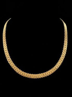 Lot 1143 - A 14ct yellow gold matte finish brick link...