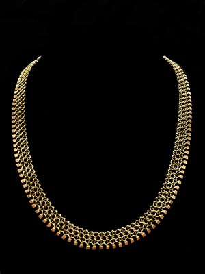 Lot 1144 - A 14ct two tone gold fringe necklace, length...