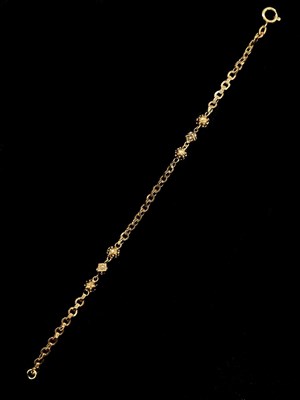 Lot 1148 - A 9ct rose gold fancy link bracelet, length...
