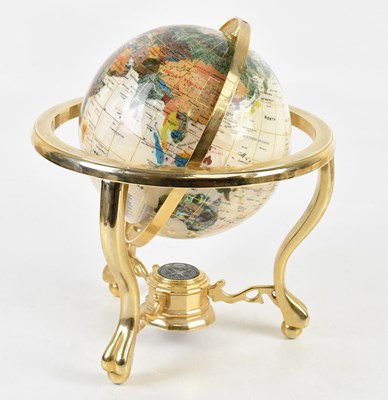 Lot 1468 - A polished specimen stone globe on chrome...