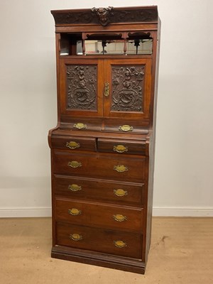 Lot 589 - A late Victorian walnut side cabinet with well...