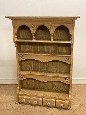 Lot 592 - A pine hanging spice rack/shelving unit, with...