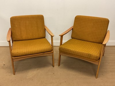 Lot 587 - A pair of mid 20th century beech framed lounge...