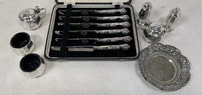 Lot 1050 - An Elizabeth II hallmarked silver six piece...
