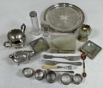 Lot 1040 - An Edwardian hallmarked silver sauceboat,...