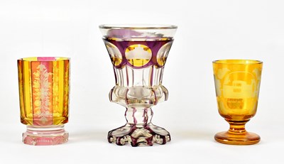 Lot 323 - A 19th century Bohemian overlaid glass goblet...