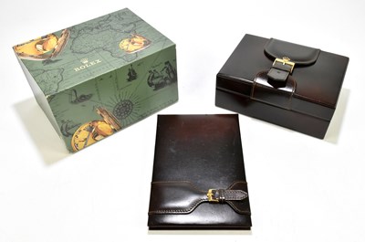 Lot 1702 - ROLEX; a wristwatch case and matching desk...