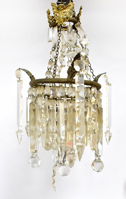 Lot 160 - An Empire-style waterfall cut glass chandelier...