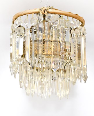 Lot 159 - A cut glass three-tier waterfall chandelier...