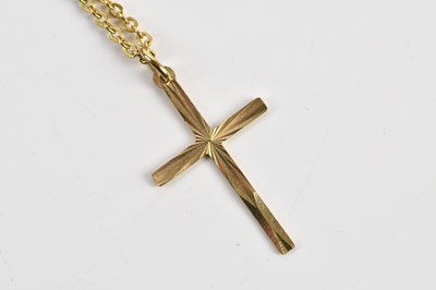 Lot 392 - A 9ct yellow gold fine link chain, suspending...