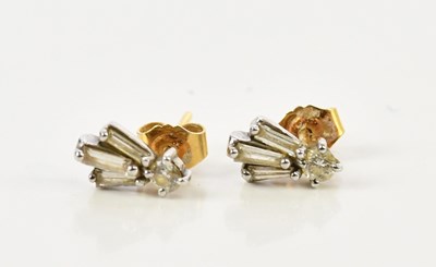 Lot 293 - A pair of yellow gold and diamond ear studs,...