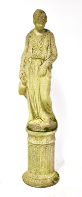 Lot 143 - A reconstituted stone garden statue of a...
