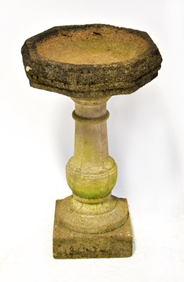 Lot 137 - A reconstituted stone garden bird bath of...