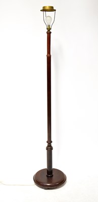 Lot 171 - A mid-20th century mahogany standard lamp with...